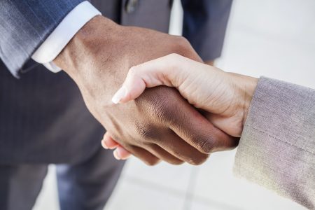 Business partners shaking hands